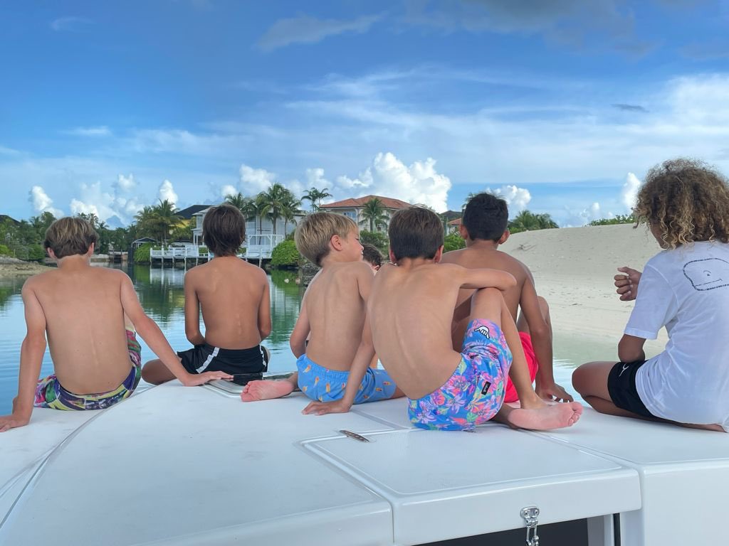 My boys with friends in the Bahamas. #BlueLagoon. 