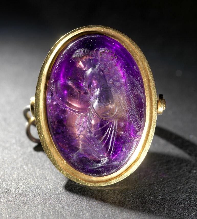 This dazzling Roman intaglio is our . Engraved in shimmering amethyst c