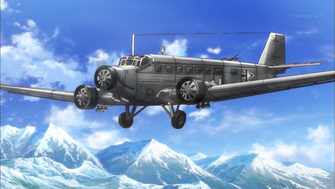 「終末のイゼッタ」序盤で登場したJunkers Ju52。搭載する動力機関は、航空機エンジン製造を祖業とするBMW製で 「終末のイゼッタ」序盤で登場したJunkers Ju52。搭載する動力機関は、航空機エンジン製造を祖業とするBMW製で