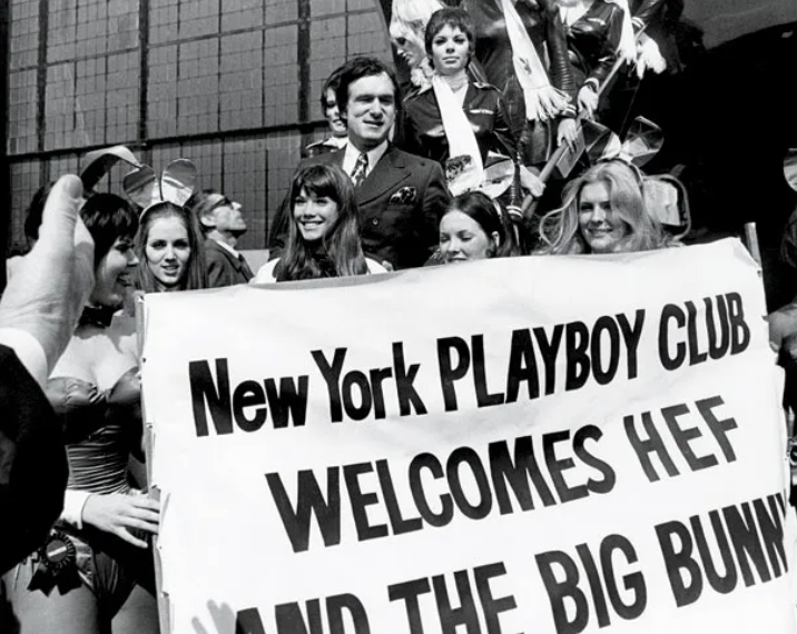 1970 - Hef, Barbie Benton and Bunnies disembark from The Big Bunny, Hefner’s private DC-9, in New York. 