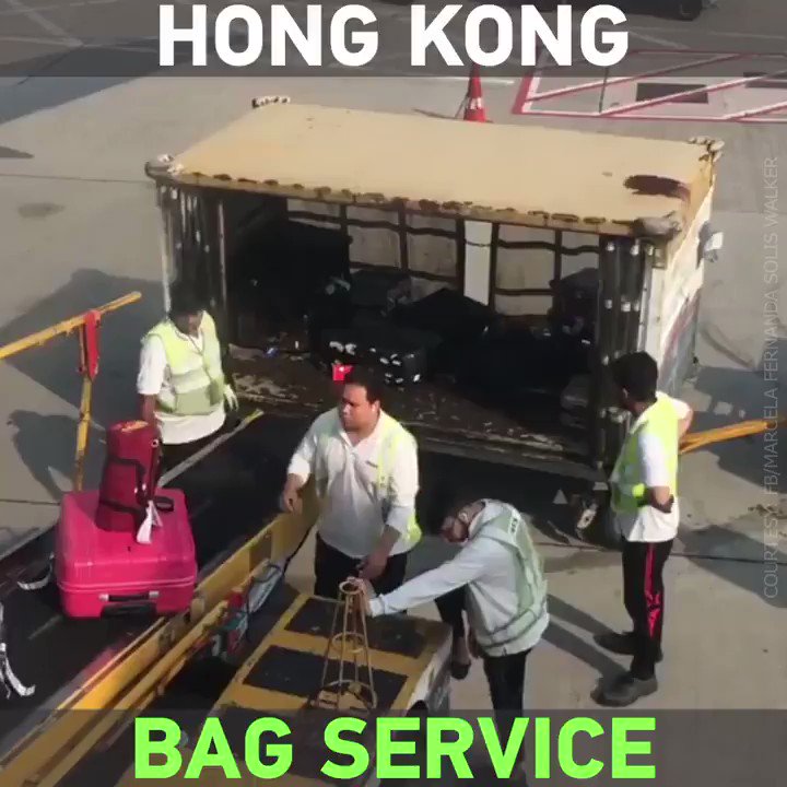 RT on Twitter "Baggage handlers at Hong Kong Airport were caught red