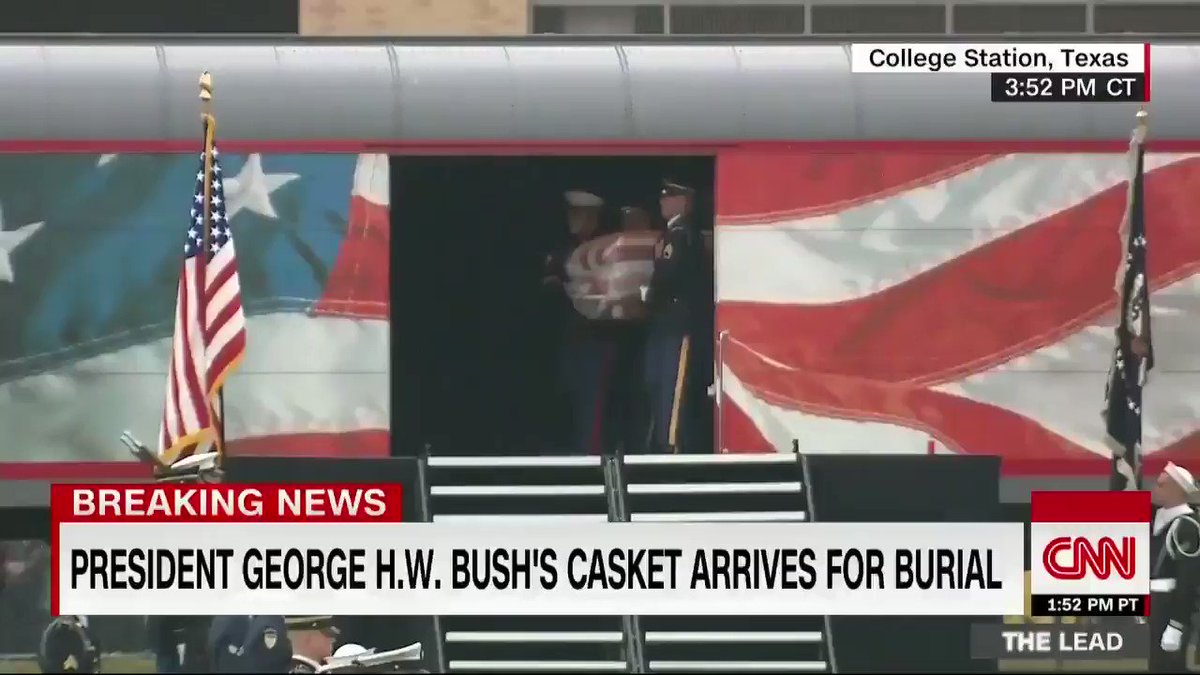 Former President George H.W. Bush's casket is carried off his funeral train, with a special locomotive dubbed "Bush 4141," after arriving at Texas A&M University in College Station, Texas. https://cnn.it/2UlSd0R