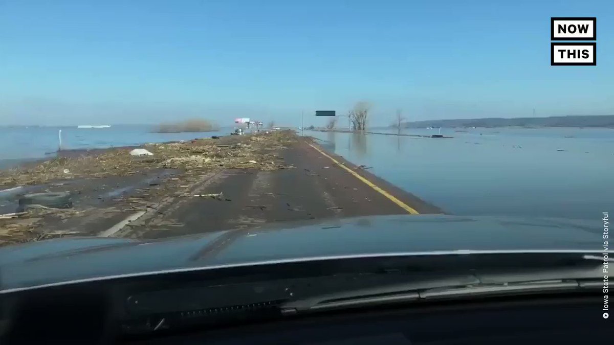 Record flooding has turned this strip of highway into an 'island strip' in the middle of Iowa
