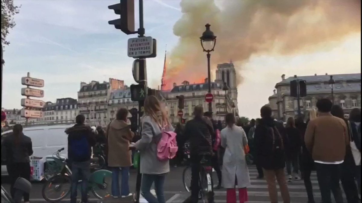 The spire collapses at Paris’ Notre-Dame Cathedral as the centuries-old landmark is engulfed in flames https://reut.rs/2KGXqzz