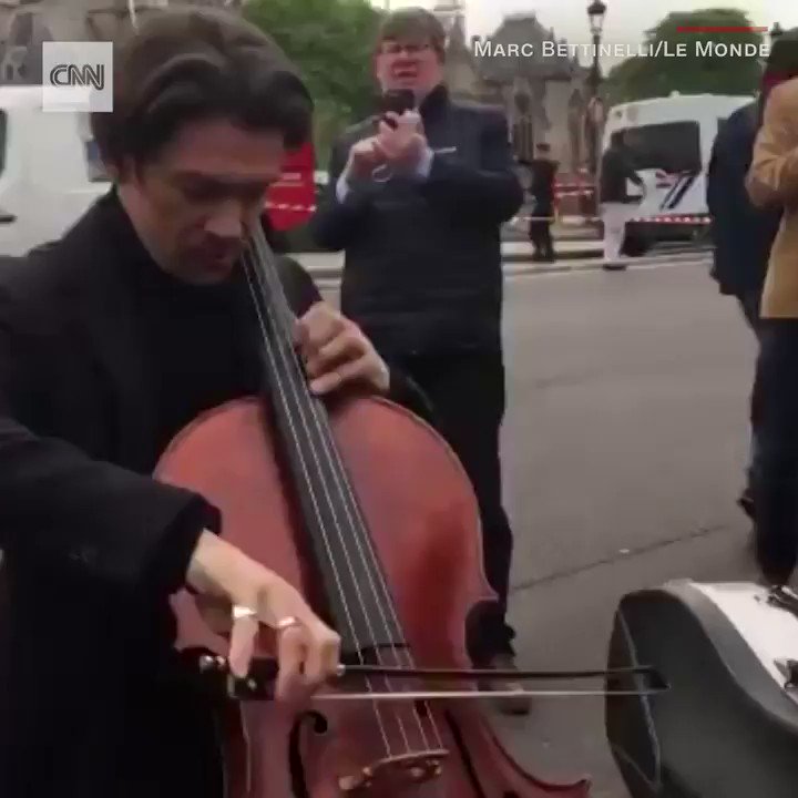 A day after Paris watched a piece of its history burn, French cellist Gautier Capuçon performed in front of the Notre Dame cathedral to send a message of hope https://cnn.it/2XkHODr