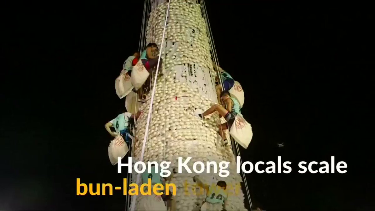 Seven-day Cheung Chau Bun Festival comes to an end with participants scaling 60-foot bun-laden tower