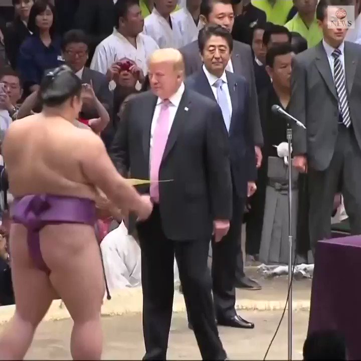 President Trump bestows the massive 4 1/2 foot, 70-pound President's Cup to the champion of Tokyo’s top sumo tournament, Asanoyama Hideki, during his state visit to Japan. https://abcn.ws/2HXXQwP