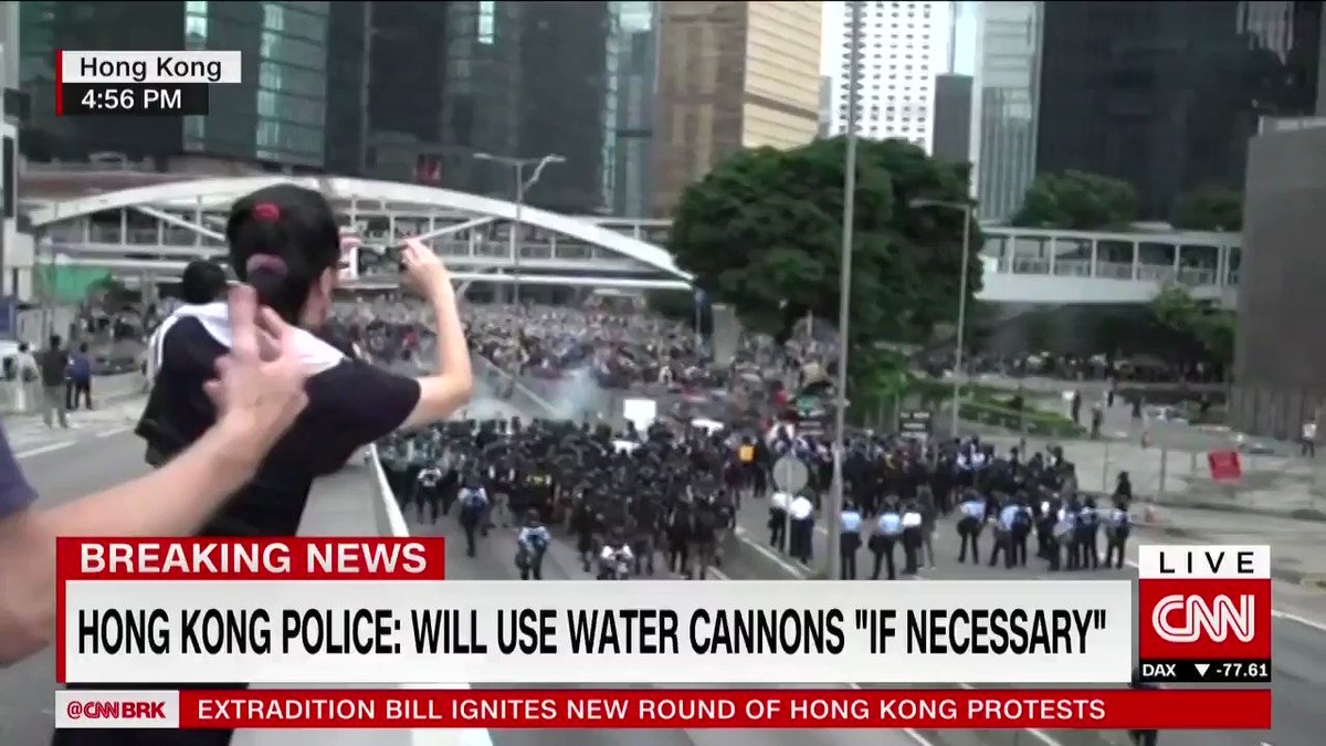 Hong Kong police fire tear gas into crowds of protesters. They have also confirmed using batons, pepper spray and rubber bullets to disperse demonstrators. Live updates: http://cnn.it/2I8XJQq