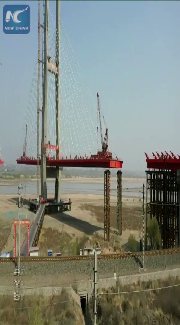 This cable-stayed bridge across the Yellow River is near completion in western China. Watch how it was constructed