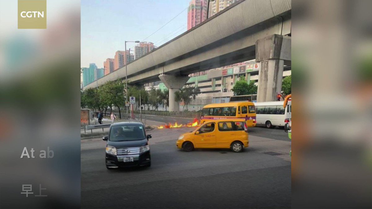 Petrol bombs thrown by rioters start fire in front of school bus in #HongKong