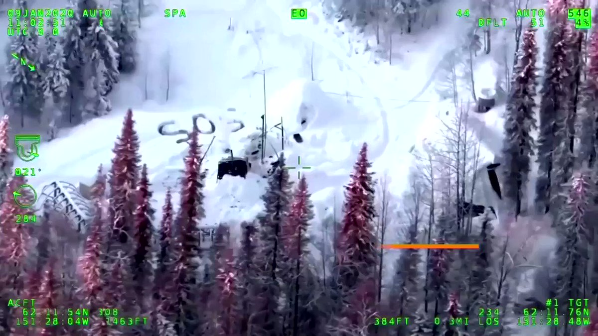 A man survived the Alaskan wilderness for three weeks after a fire destroyed his cabin. A video of his rescue released by Alaska State Troopers shows a giant 'S.O.S.' carved out in snow