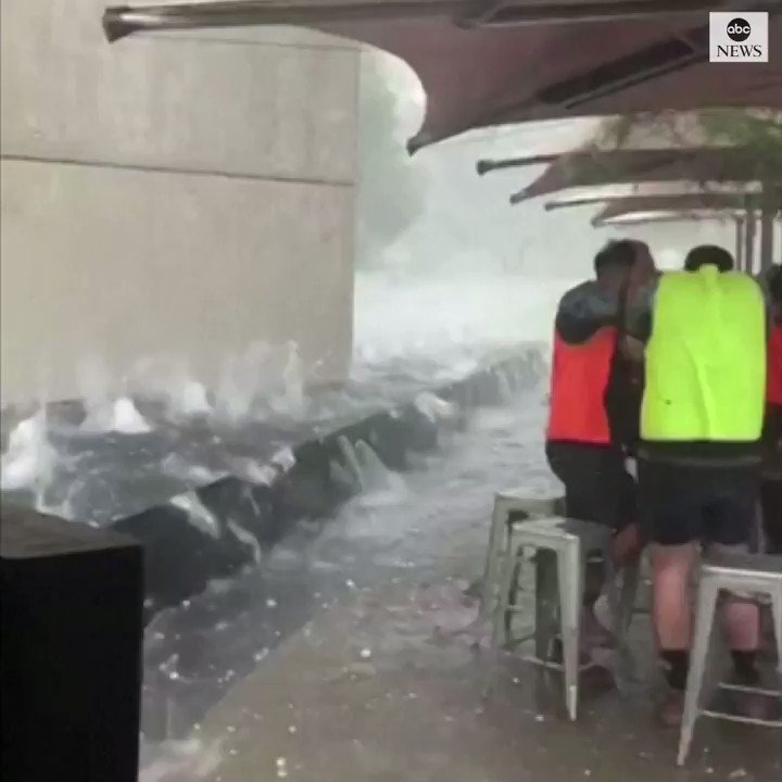 People take shelter from golf ball-sized hail stones, as an intense storm batters Canberra, Australia's capital city. https://abcn.ws/36d1xJc