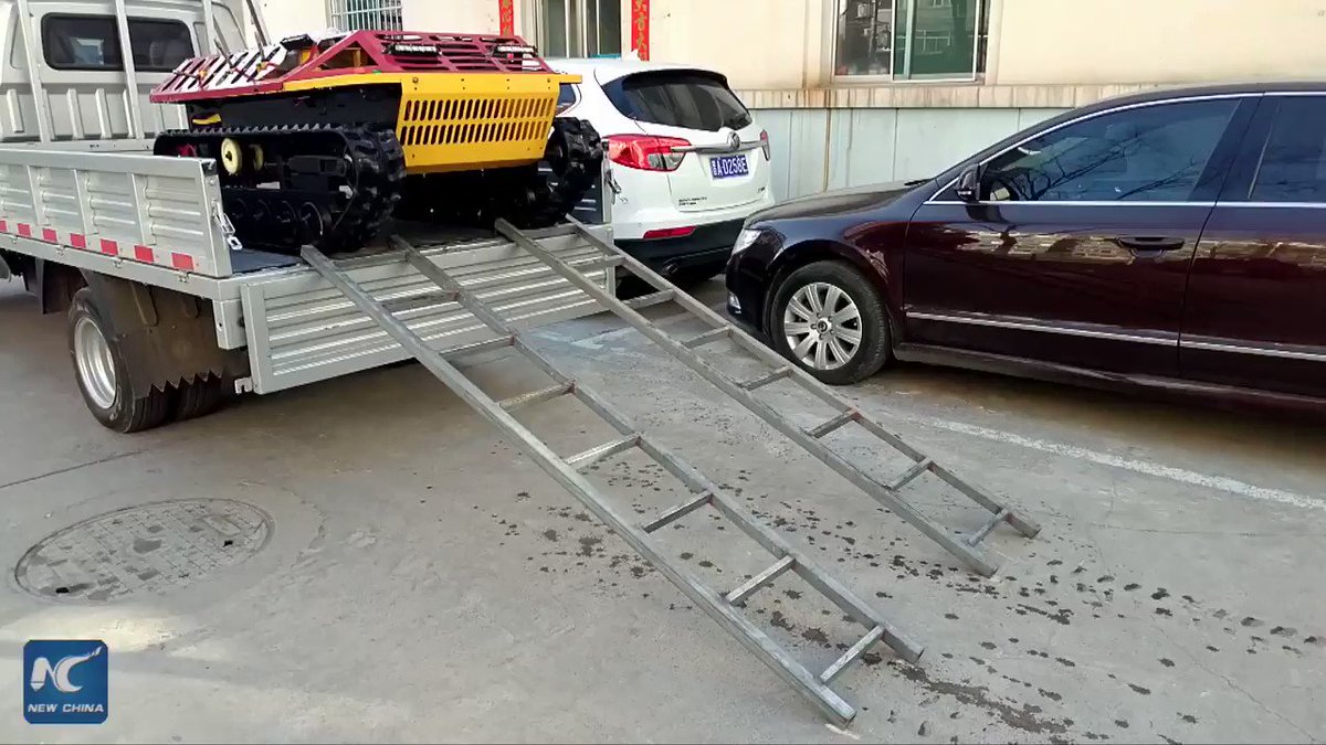 Check out these miniature 'tanks' in Shanxi Province, China. Rather than fighting the epidemic, they are helping to clean it up!