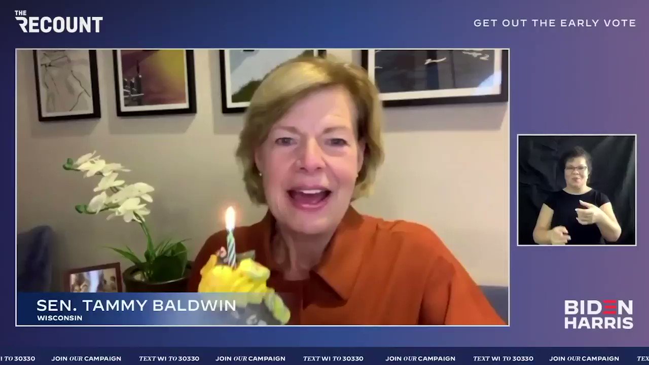 Sen. Tammy Baldwin (D-WI) presents Kamala Harris with a cupcake over Zoom to wish her a happy birthday. 