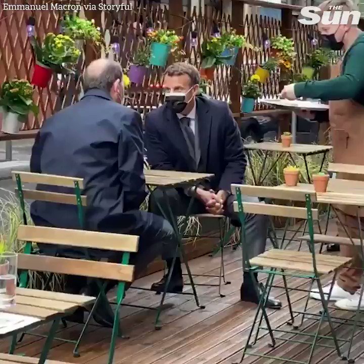 Emmanuel Macron enjoys a coffee in Paris as cafes, bars, and restaurants reopen for outdoor service in France