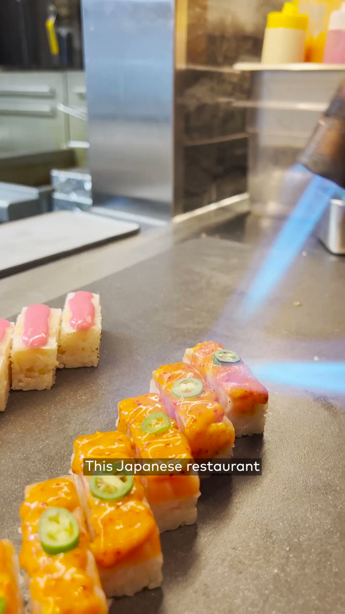 This Japanese spot is a multi-sensory experience. Find Flame Sushi located at 204 Queen St. West 🔥
