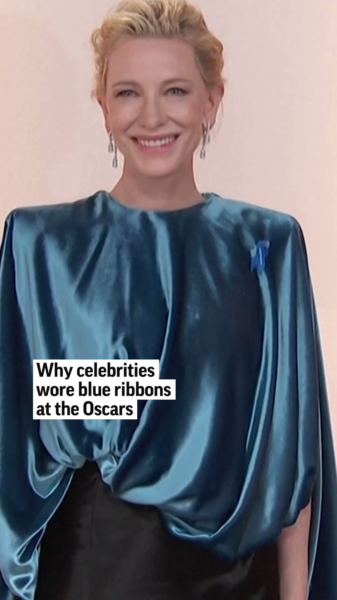 Why Celebrities Are Wearing Blue Ribbons at the 2023 Oscars