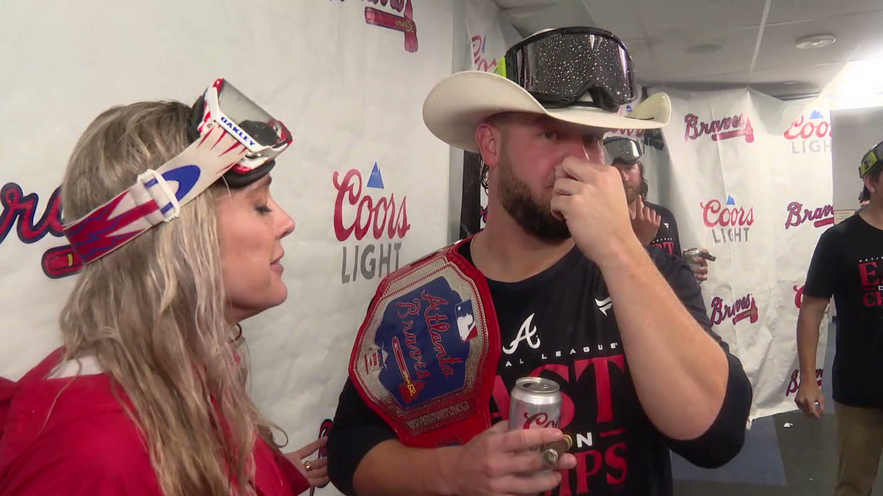 AJ Minter carries Braves title belt, wears cowboy hat during champagne  celebration 