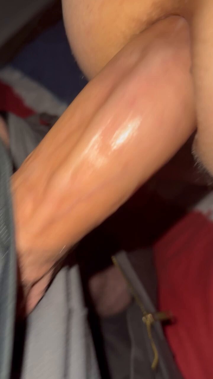 Fingers clenching on sheets