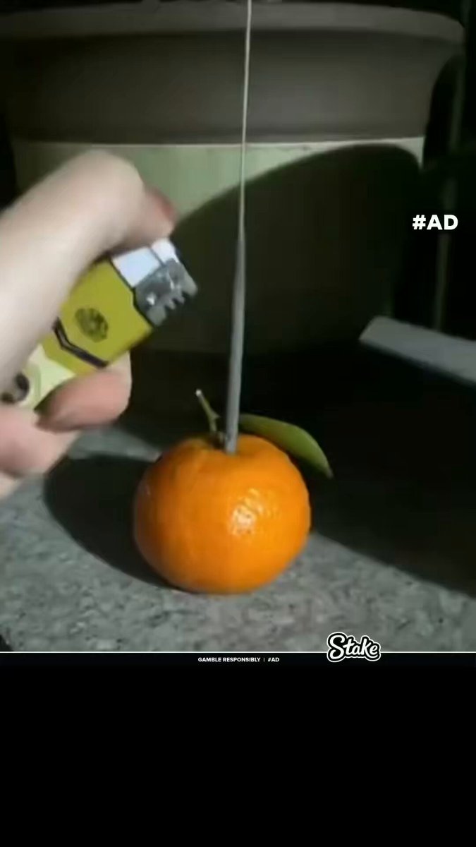 The remarkable effect of a sparkler burning inside a mandarin 