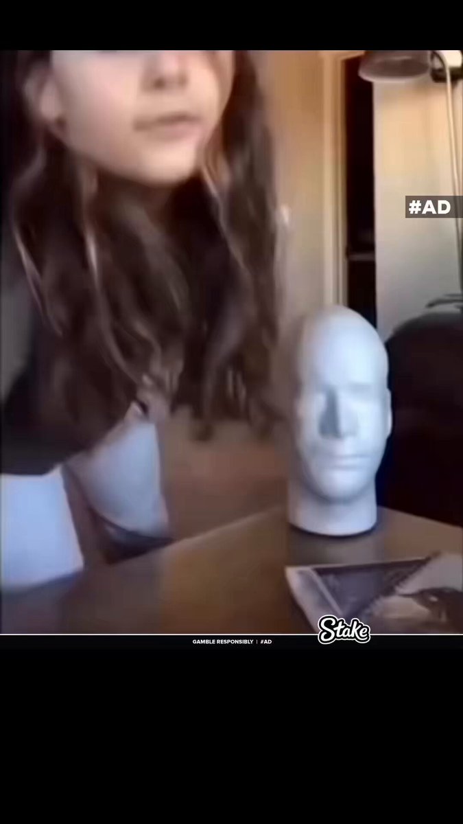 Bro's trying hard to control his laugh 