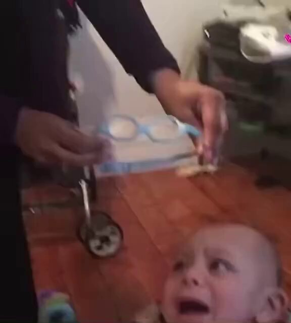 The reaction of the baby who wears glasses and starts to see clearly for the first time. 
