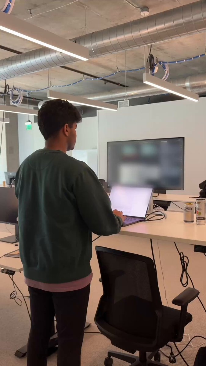 Base engineer working at a standing desk