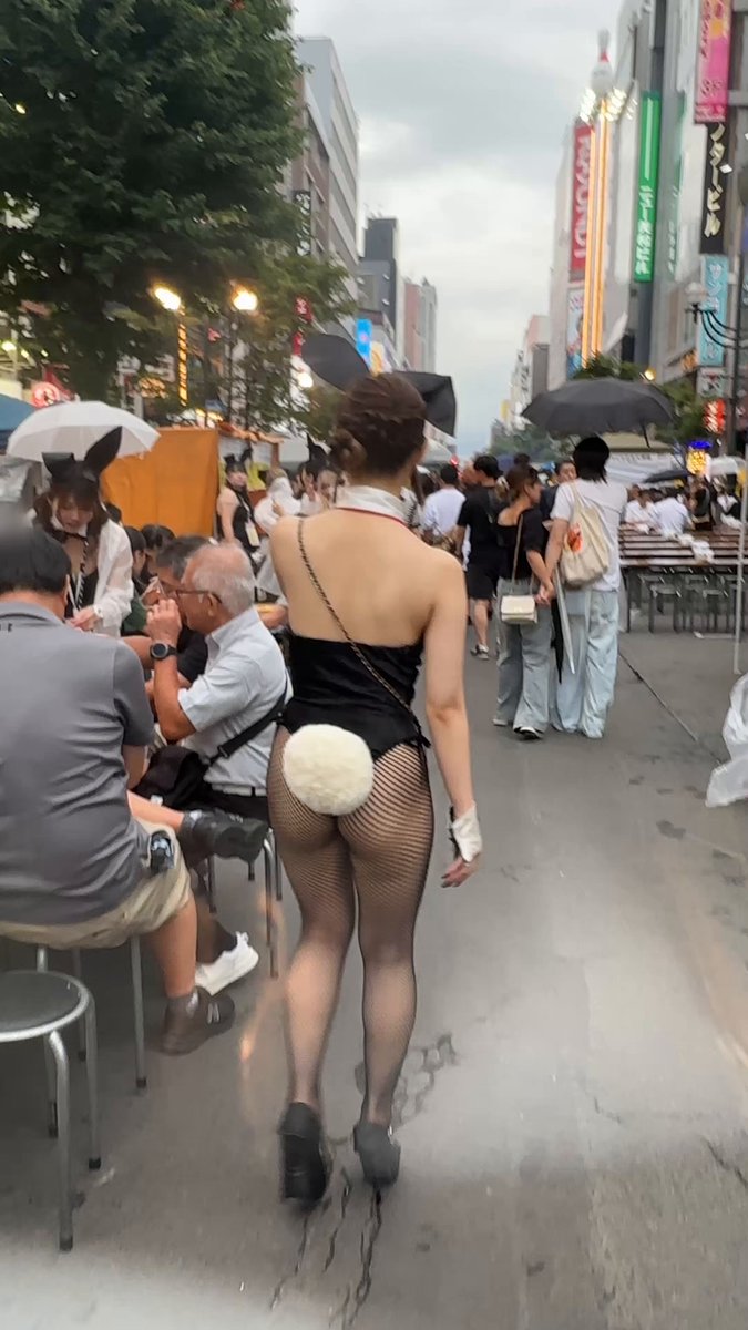 A woman’s expression twisted in pleasure