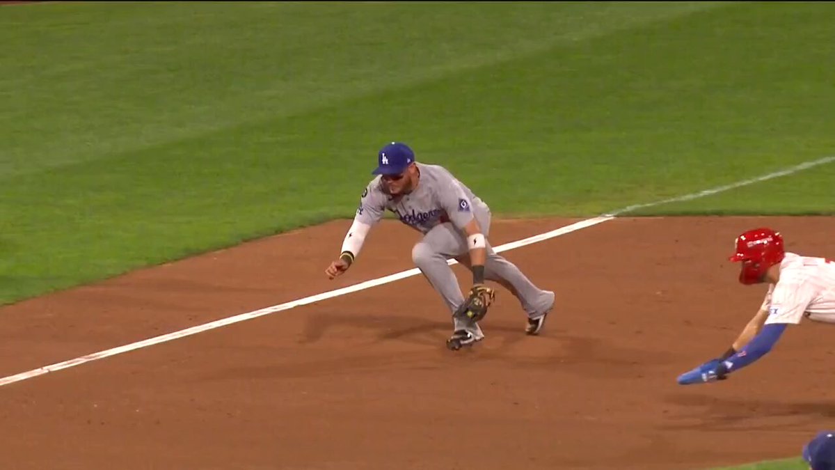 Miguel Rojas JUST beats Trea Turner to the bag 😳

#NLDS 