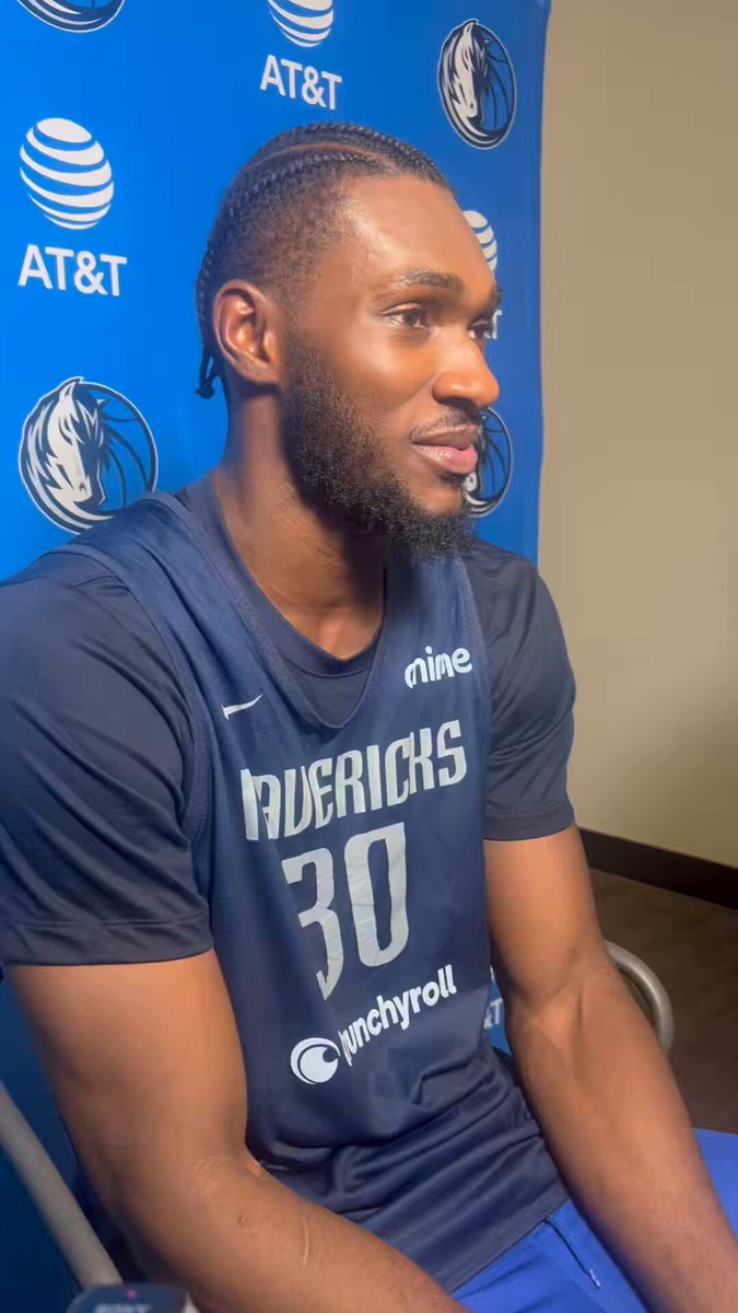 Moussa Cisse reacts to receiving a two-way contract from Mavs. 