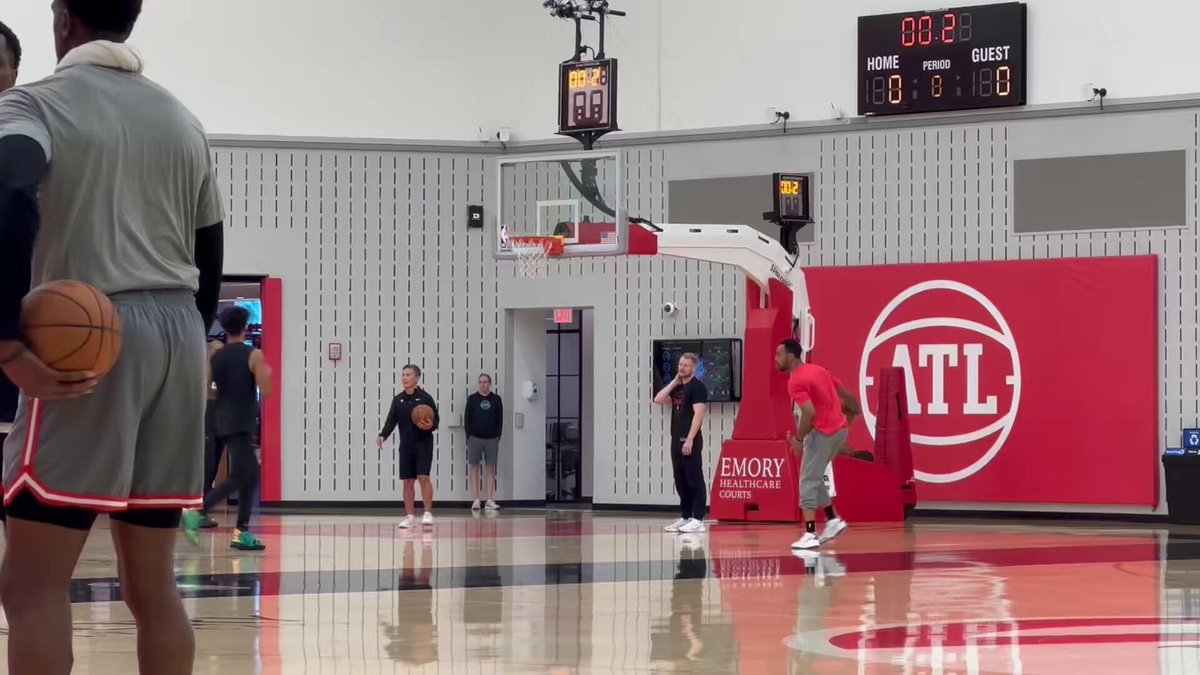 Jalen Johnson and Dyson Daniels getting shots up after practice 