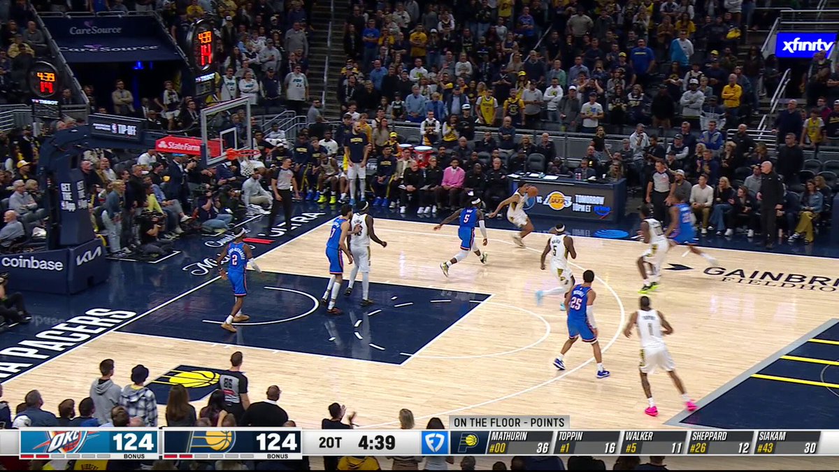 Jarace Walker goes over his defender to bank it in.
