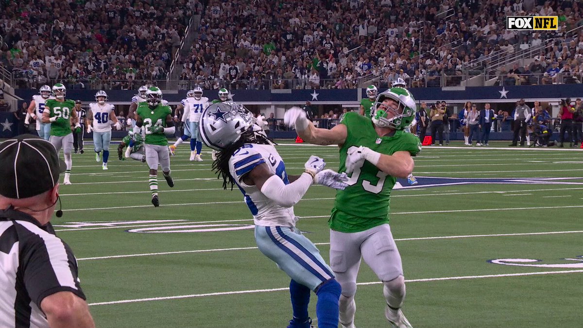 The Eagles sideline reacts to this flag. 