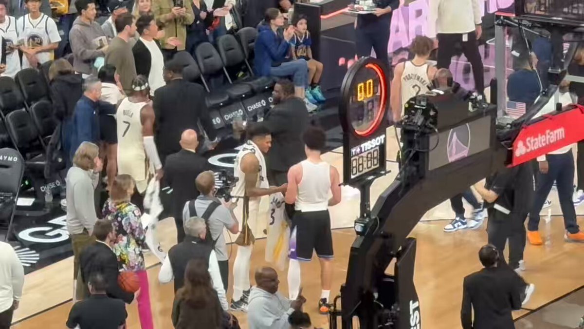 Florida teammates and reigning National champions Will Richard and Walter Clayton Jr. trade jerseys postgame. 