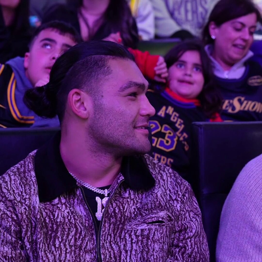 Puka Nacua of the 9-2 Rams cheering on the 12-4 Lakers! 🏈🏀 