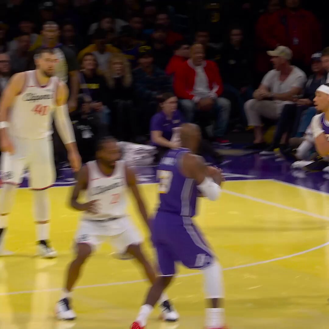 Where most would see two defenders..

LeBron James sees a passing window!  