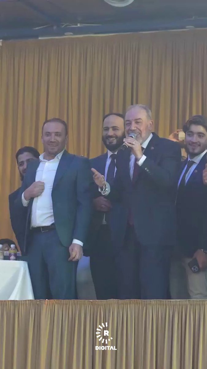 وزير الخارجية السوري أسعد الشيباني يتبرع بساعته اليدوية خلال حملة "حلب ست الكل" وأحد الحضور يتبرع بقيمة 2.5 مليون دولار مقابل الساعة 