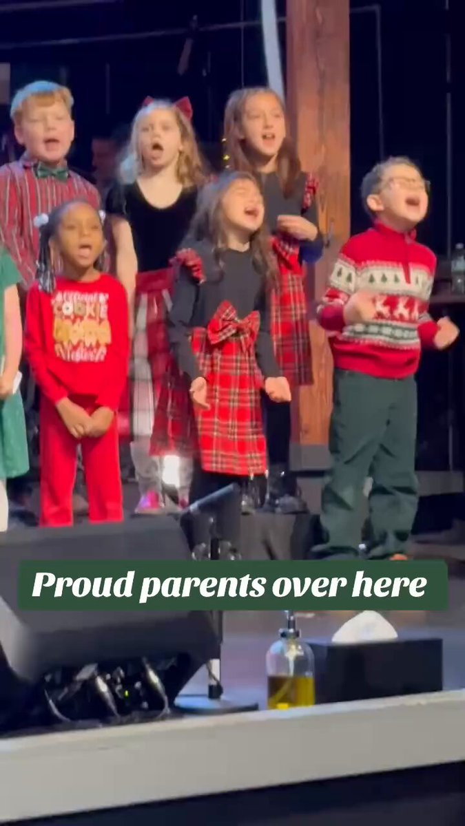 A mother filmed her two kids worshiping Jesus during their church Christmas service. It's genuine...