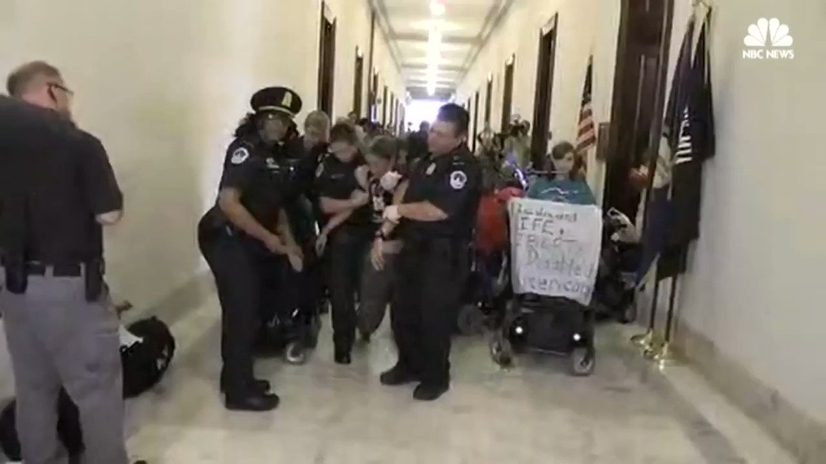 Police drag away protesters, some in wheelchairs, outside of Sen. McConnell's office after draft of Senate health care bill is revealed https://t.co/uWRR0uJniY