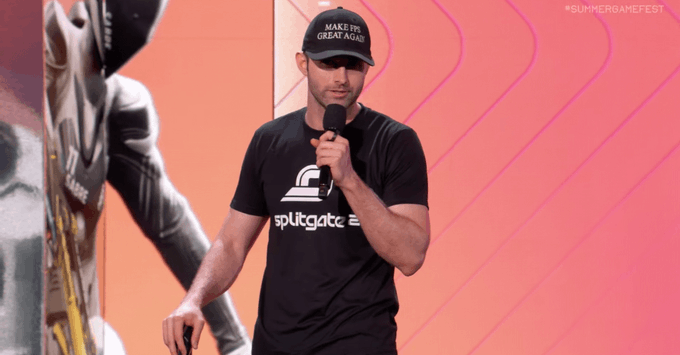 Image of Ian Proulx, the CEO of 1047 Games wearing a black hat that reads Make FPS Great Again