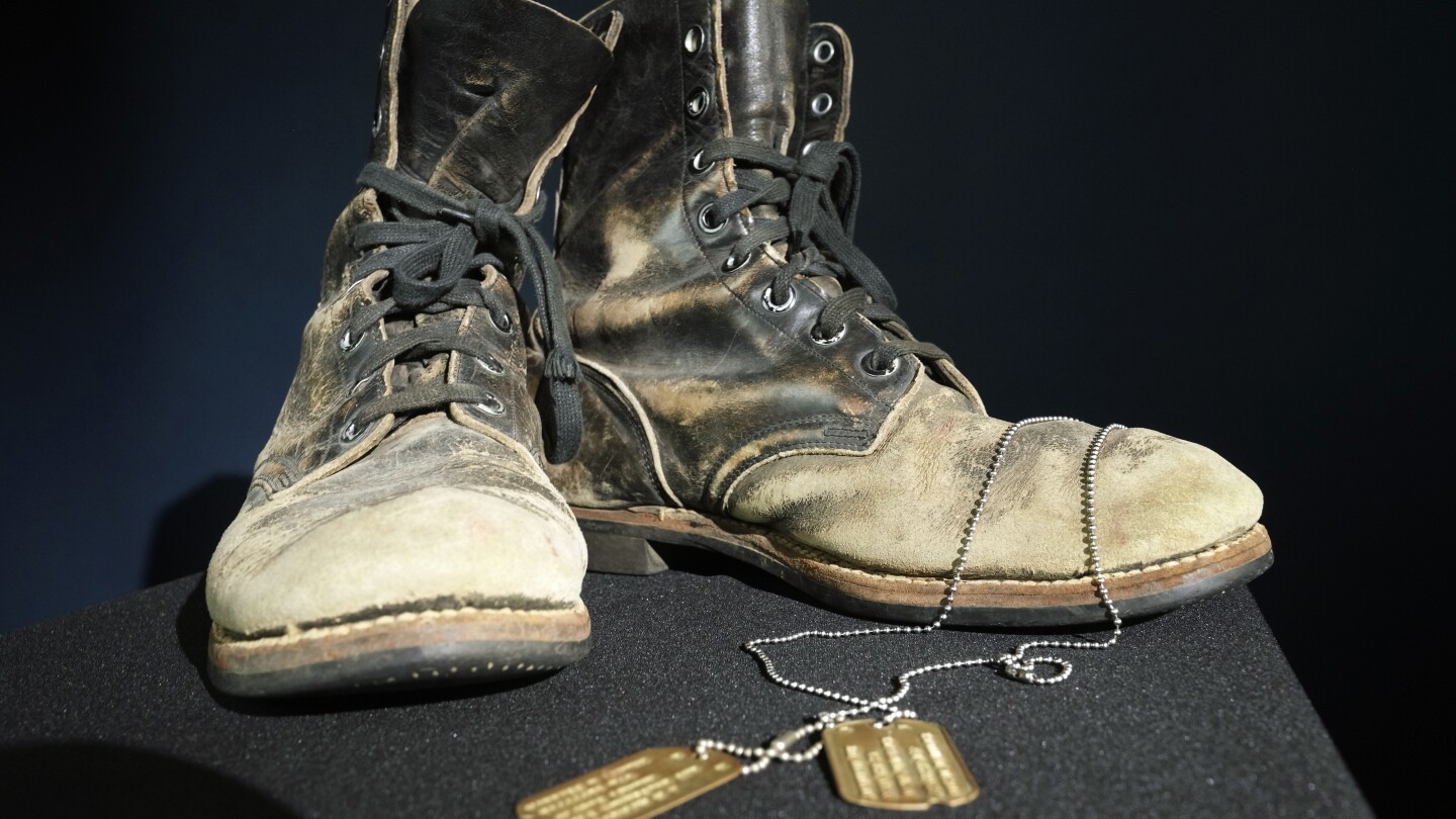 alanalda's tweet card. The combat boots and dog tags Alan Alda wore while playing the wisecracking surgeon Hawkeye on the beloved television series “M-A-S-H” have sold at auction for $125,000.