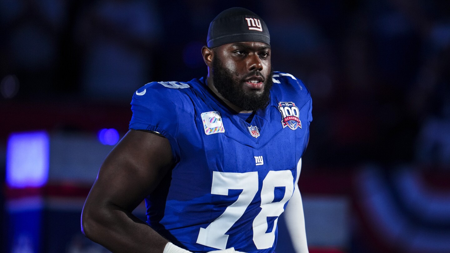 ProFootballTalk's tweet card. Giants left tackle Andrew Thomas does not have the green light to start practicing yet.