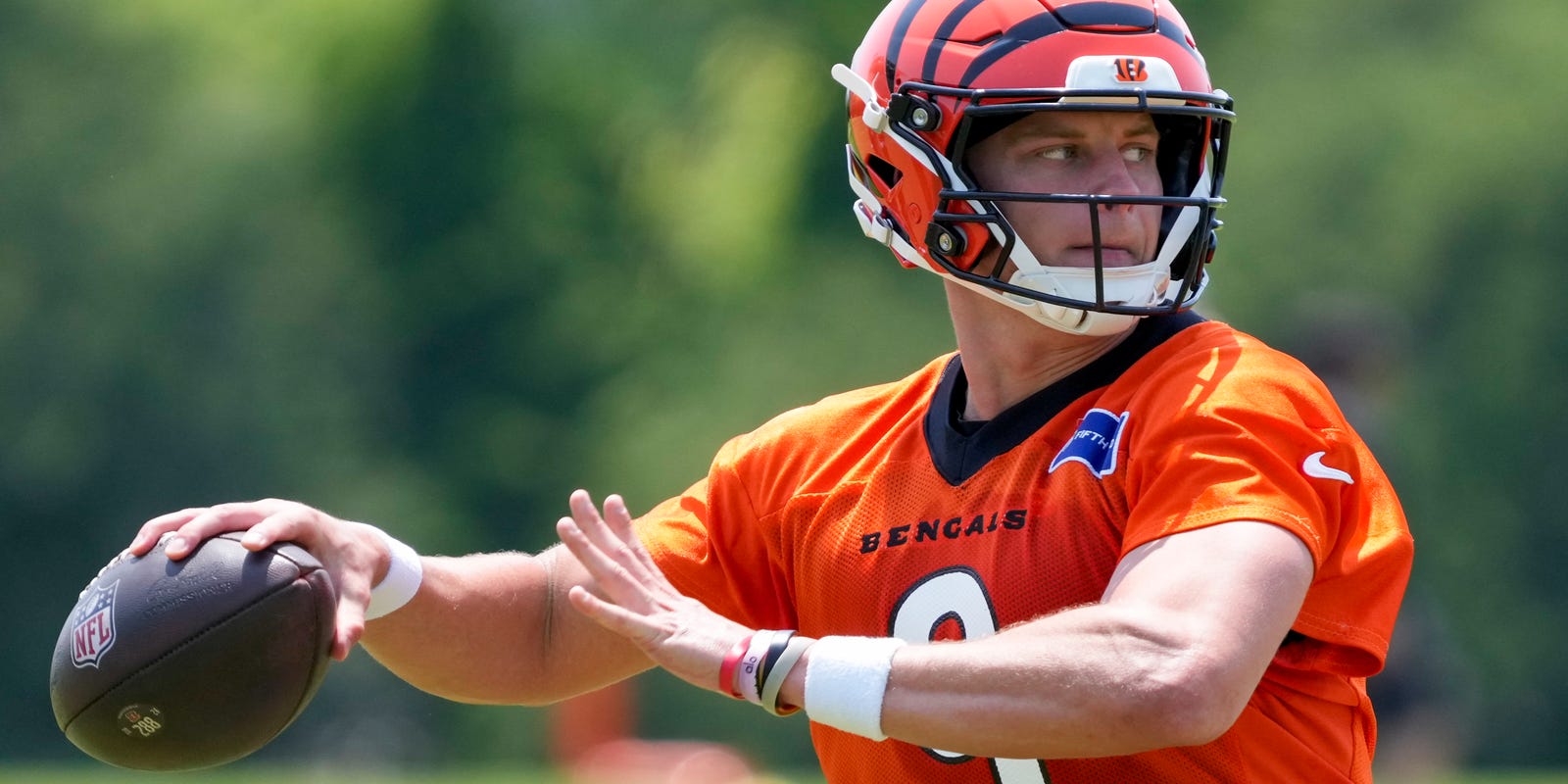 Enquirer's tweet card. Joe Burrow sported a bright-colored tie-dye shirt and black athletic shorts as he arrived for training camp.