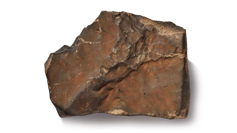 cnni's tweet card. A meteorite that is the largest known piece of Mars on Earth sold at a Sotheby’s New York auction Wednesday.