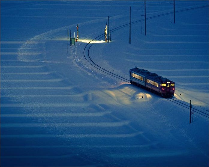 TheTexanRhino's tweet card. America is covered in dwindling small towns, but through rural railways, they can be reconnected, and new life can be breathed into them.