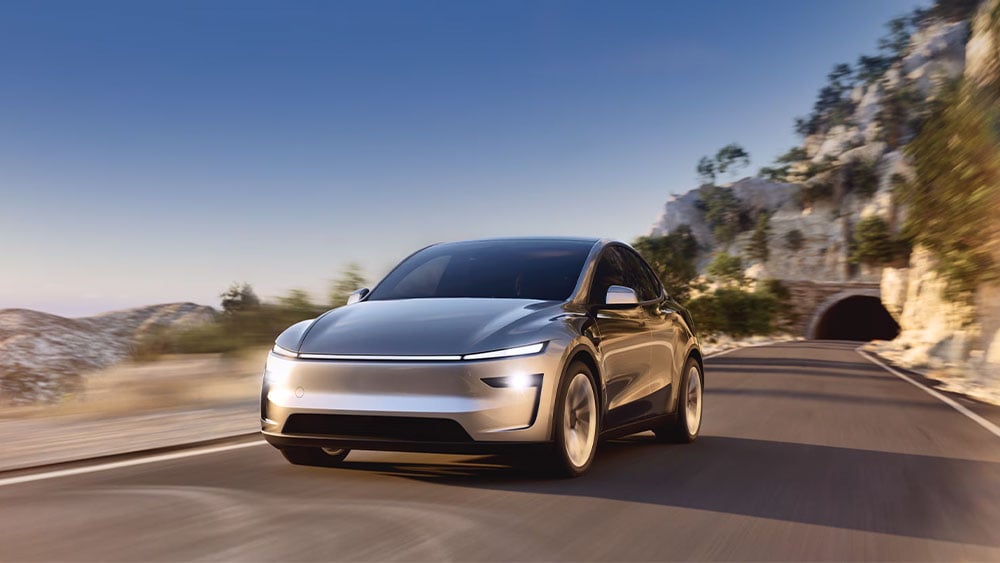 DivesTech's tweet card. Tesla reports Q2 earnings after the stock market closes on Wednesday.