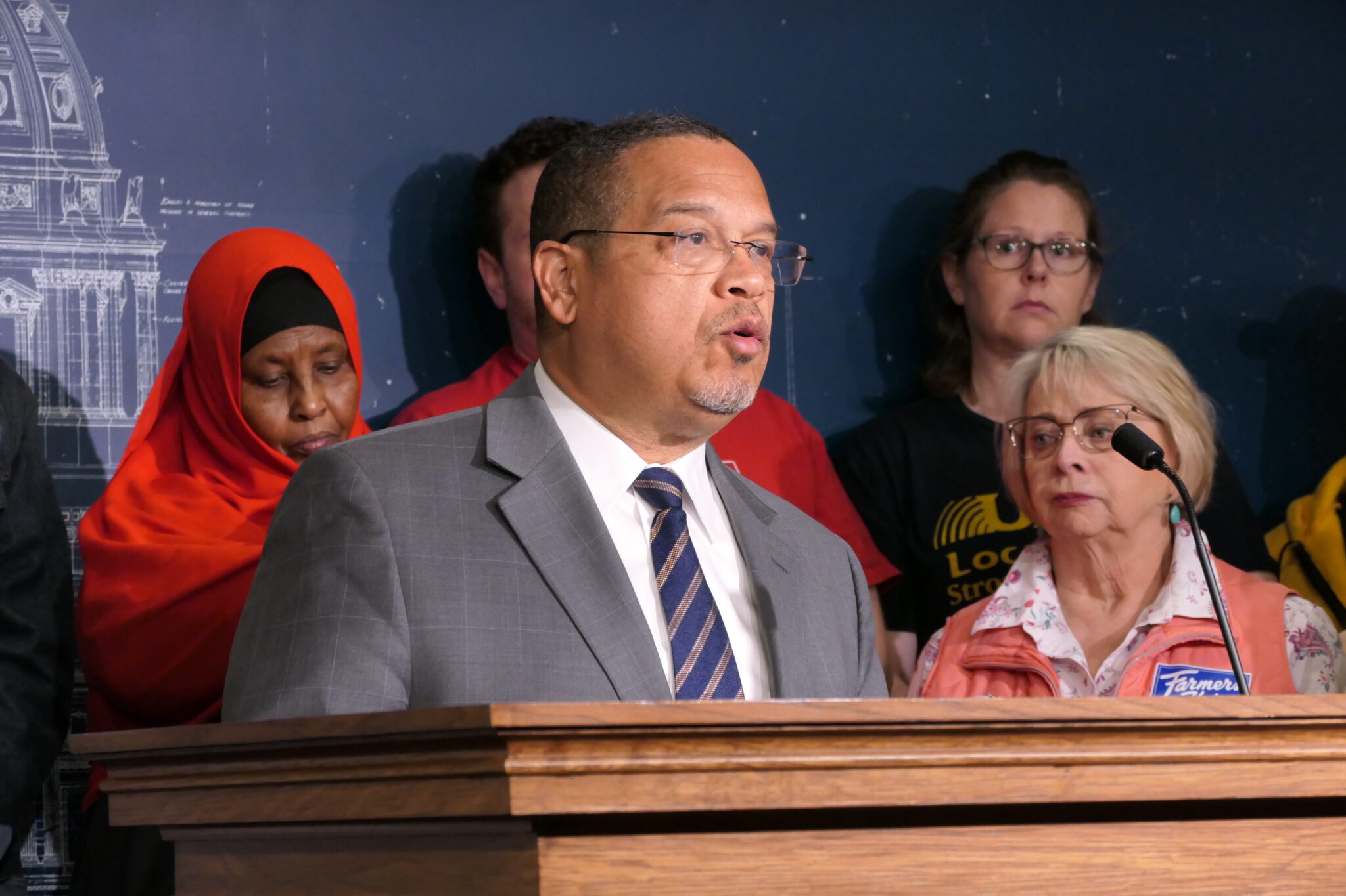 KendallQuallsMN's tweet card. Minnesota Attorney General Keith Ellison is suing the Trump administration over federal rules instructing employees to verify the immigration status of people who use social safety net programs,...