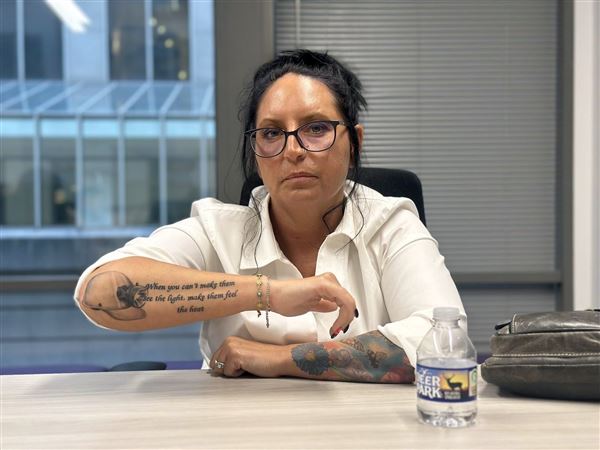 debbiecenziper's tweet card. Amanda Lawson’s 45th birthday gift to herself was a new tattoo. Her right forearm now bears a coal miner’s helmet shining a light with the...