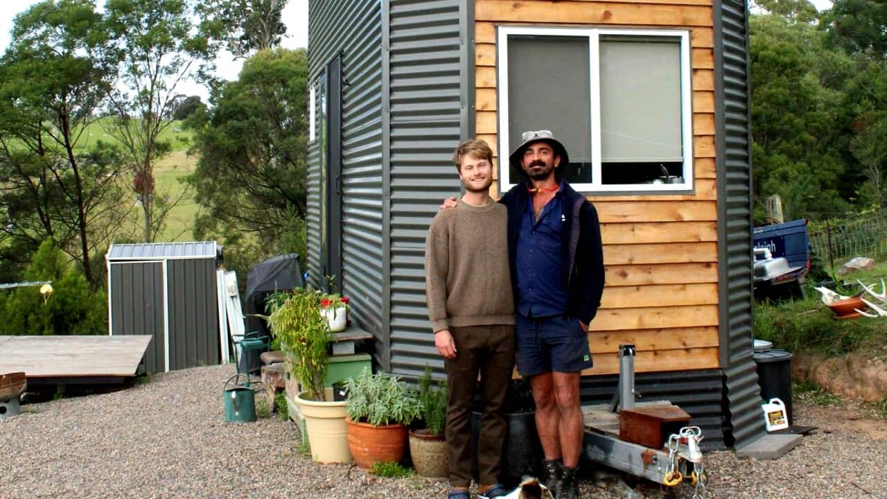 Flyin_Kevin's tweet card. Manu's tiny home saved him after catastrophic bushfires. But legislation means he may have to demolish it — and that could leave him homeless.