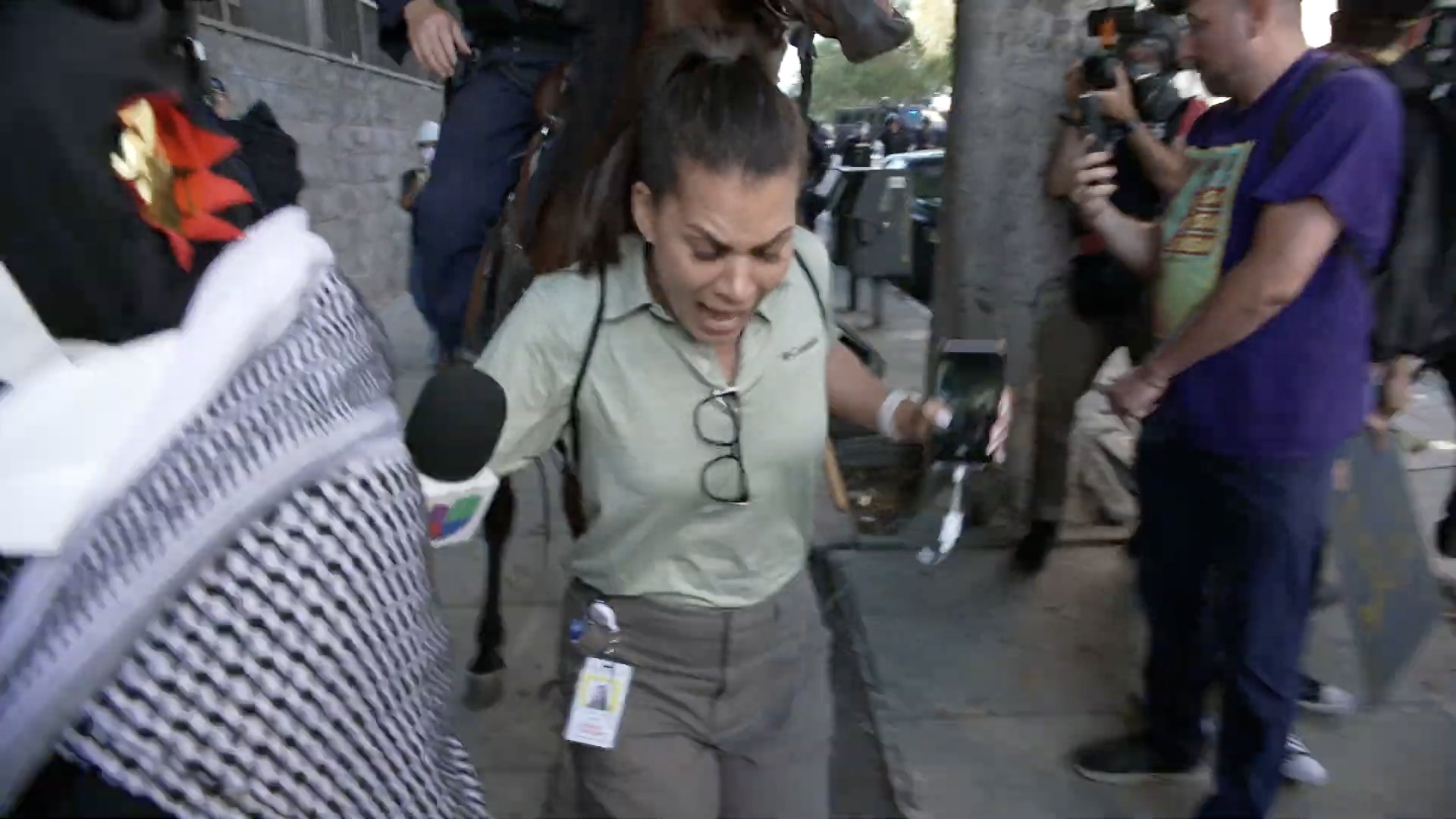 uspresstracker's tweet card. Romi De Frias, a national reporter for Univision, was thrust forward by a mounted police officer while covering a protest …